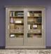 Bibliothèque 2 portes coulissantes réalisée en Chêne massif de style Directoire Finition Taupe Patiné Bibliothèque Bibliothèque 2 portes coulissantes réalisée en Chêne massif de style Directoire Finition Taupe Patiné Bibliothèque