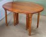 Table ovale à volets 135X110 en merisier massif de style Louis Philippe 10 pieds - 10 allonges de 40 Table Ovale 
